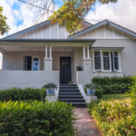 A 50s style home with a path leading up to the front stairs. Older investment properties have normally been renovated so there is often plenty of depreciation to be claimed.