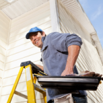 A repair person climbs a ladder to repair a damaged weatherboard. Now is the time to spend money on your property because you get to claim it back quickly.